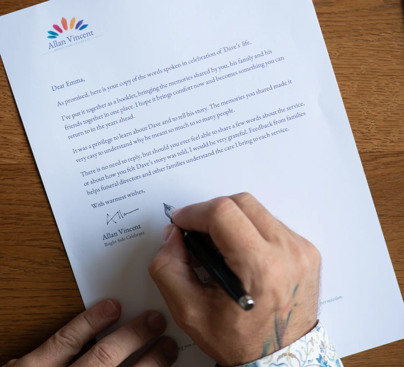 Allan Vincent signing an example Bright Side letter